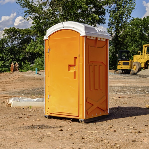 how often are the porta potties cleaned and serviced during a rental period in Scott County